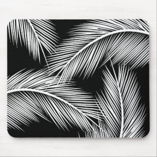 White palm leaves on black colour background mouse mat