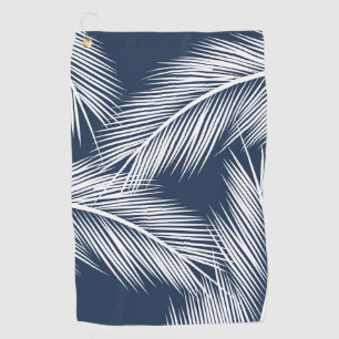 White palm leaves on dark blue colour background golf towel