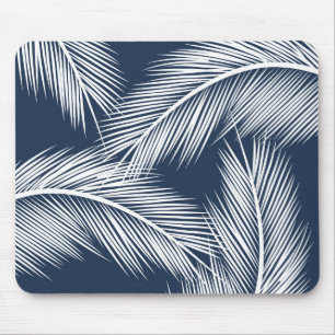 White palm leaves on dark blue colour background mouse mat