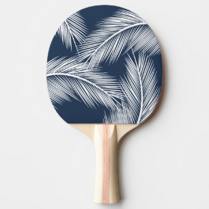 White palm leaves on dark blue colour background ping pong paddle