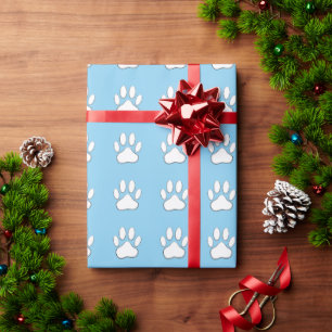 White Paw Print Cartoon Drawing Pattern On Blue Wrapping Paper