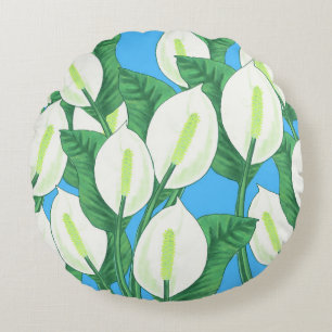 White peace lilies on pale blue background round cushion