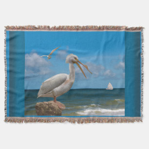 White Pelican on a Rock Throw Blanket