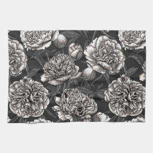 White peony flowers on dark gray tea towel