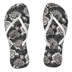 White peony flowers on dark grey flip flops