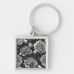 White peony flowers on dark grey key ring
