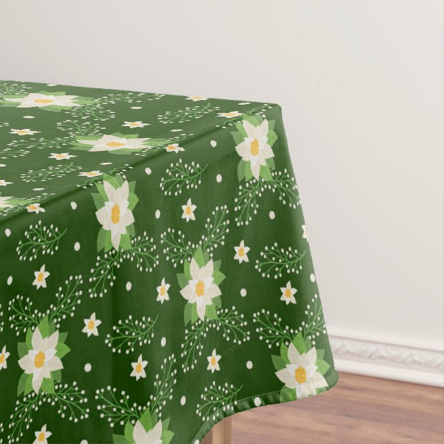 White Poinsettias Green Leaves Christmas on Green Tablecloth (In Situ)