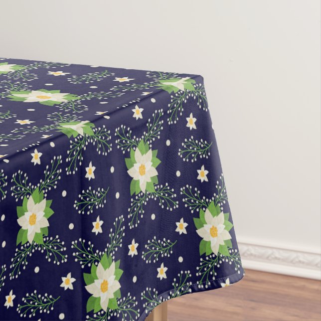 White Poinsettias Green Leaves Christmas on Navy Tablecloth (In Situ)