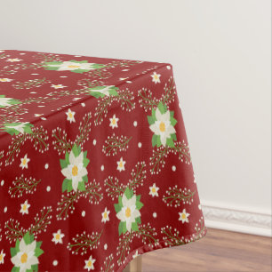 White Poinsettias Green Leaves Christmas on Red Tablecloth