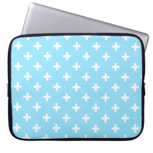 White polka crosses on baby blue laptop sleeve