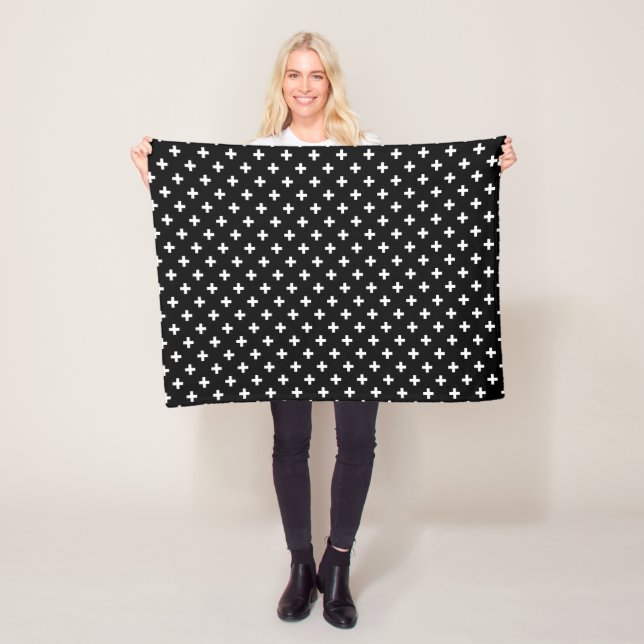 White polka crosses on black fleece blanket (In Situ)