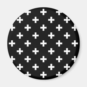 White polka crosses on black magnet