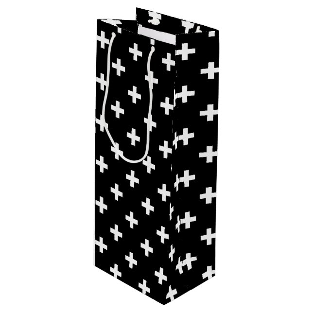 White polka crosses on black wine gift bag (Front Angled)