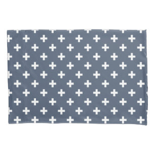 White polka crosses on blue-grey pillowcase