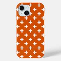 White polka crosses on burnt orange