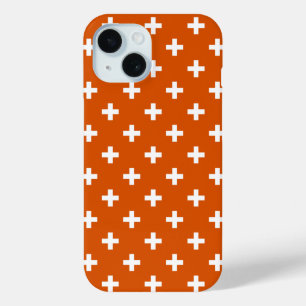 White polka crosses on burnt orange iPhone 15 case