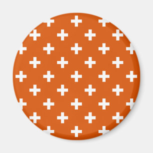 White polka crosses on burnt orange magnet
