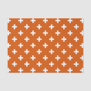 White polka crosses on burnt orange tissue paper