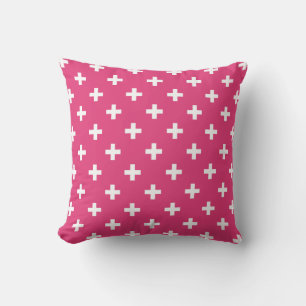 White polka crosses on fuchsia cushion