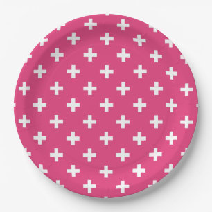 White polka crosses on fuchsia paper plate