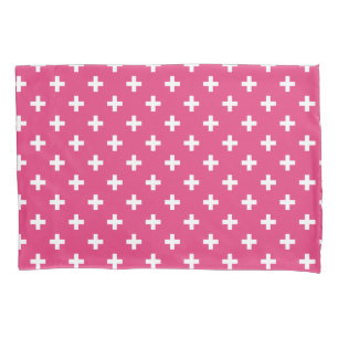 White polka crosses on fuchsia pillowcase