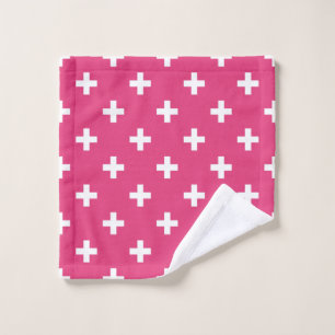 White polka crosses on fuchsia wash cloth