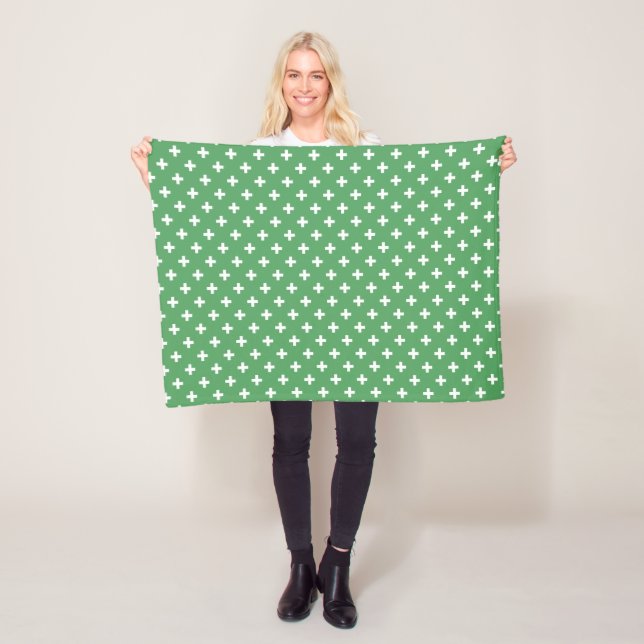 White polka crosses on green fleece blanket (In Situ)