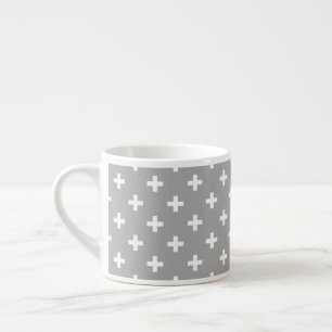 White polka crosses on grey espresso cup