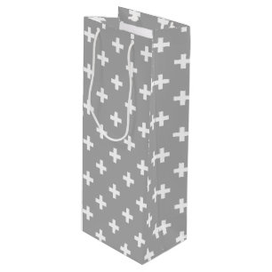 White polka crosses on grey wine gift bag