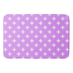 White polka crosses on lilac bath mat