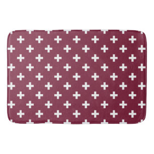 White polka crosses on mulberry bath mat