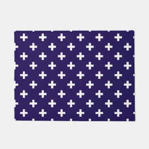 White polka crosses on navy blue doormat