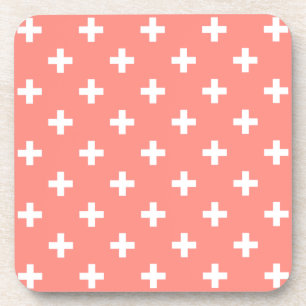 White polka crosses on peach coaster