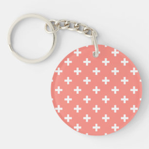 White polka crosses on peach key ring