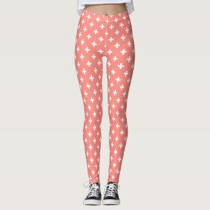 White polka crosses on peach leggings