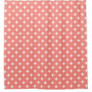 White polka crosses on peach shower curtain