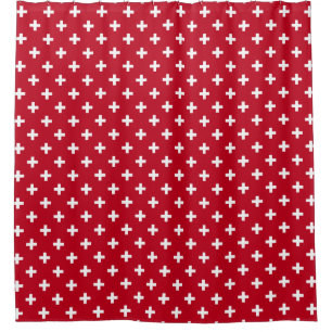 White polka crosses on red shower curtain