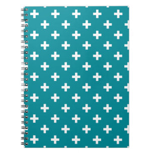 White polka crosses on teal notebook
