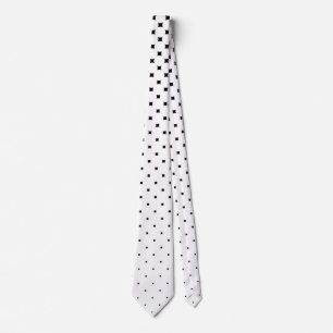 White polka dot graduation and black background tie