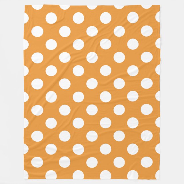 White polka dots on amber fleece blanket (Front)