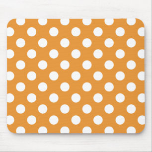 White polka dots on amber mouse mat