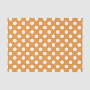 White polka dots on amber tissue paper