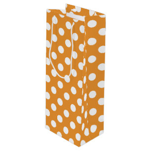 White polka dots on amber wine gift bag