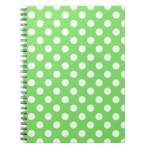 White polka dots on apple green notebook