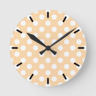 White polka dots on beige round clock