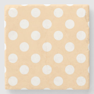 White polka dots on beige stone coaster