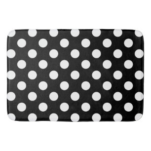 White polka dots on black bath mat