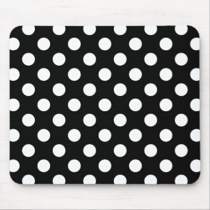 White polka dots on black mouse mat