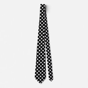 White polka dots on black tie