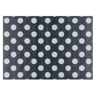 White polka dots on blue-gray cutting board